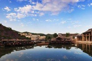 23座丰田考斯特古北水镇租车当天往返带司机多少钱？